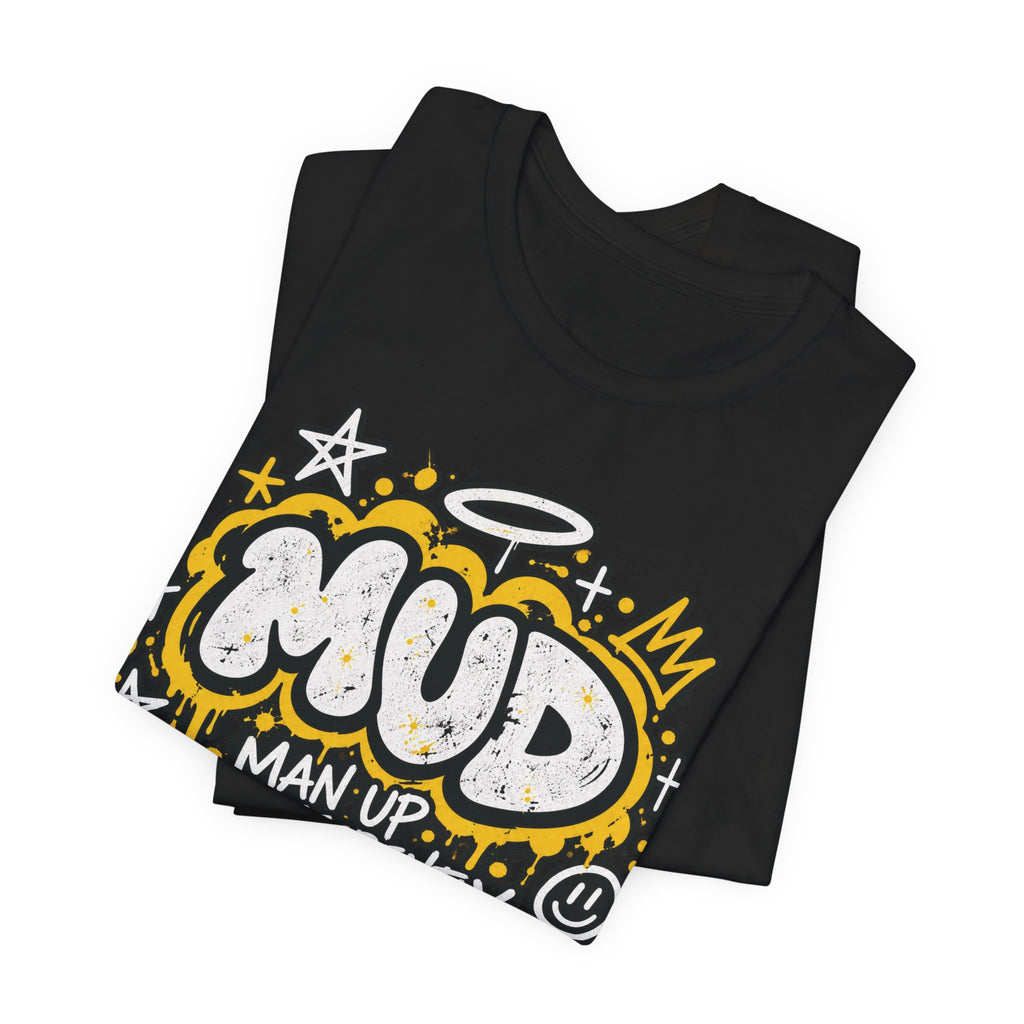Folded black BE LOUD Tees showing MUD chest graphic