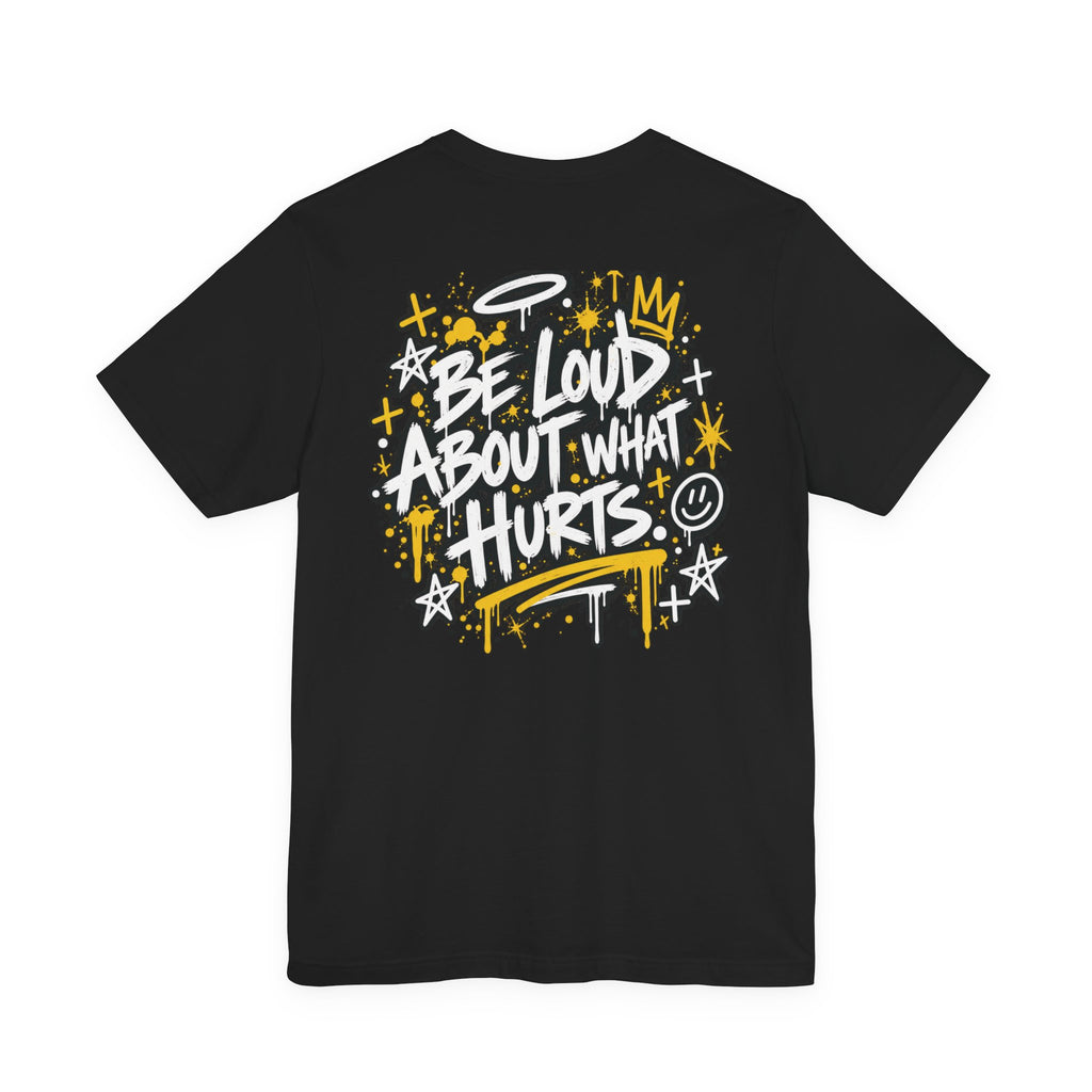 Black BE LOUD Tee flat lay back view with Be Loud About What Hurts graphic