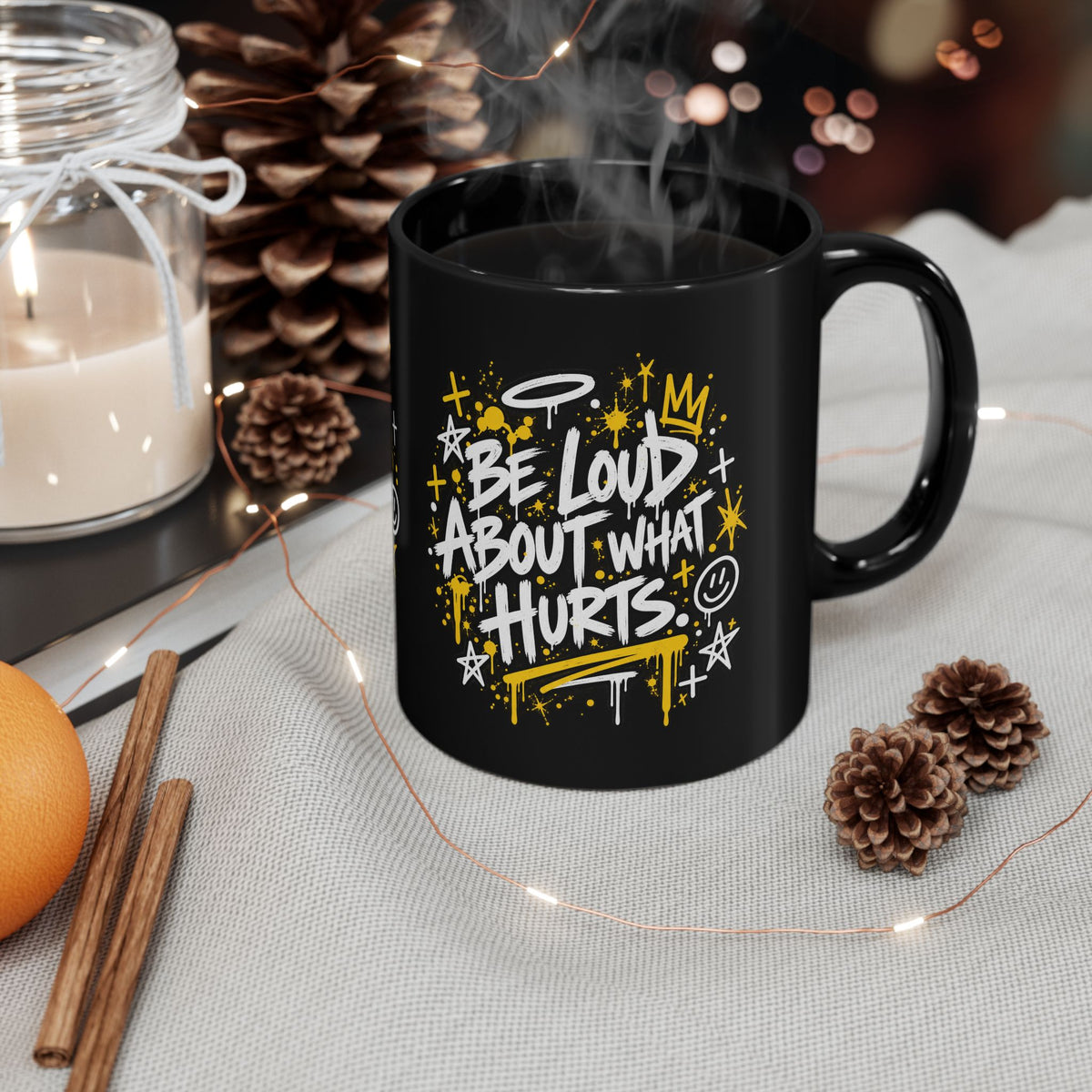Outside The Lines Mug with Be Loud About What Hurts design and steaming coffee