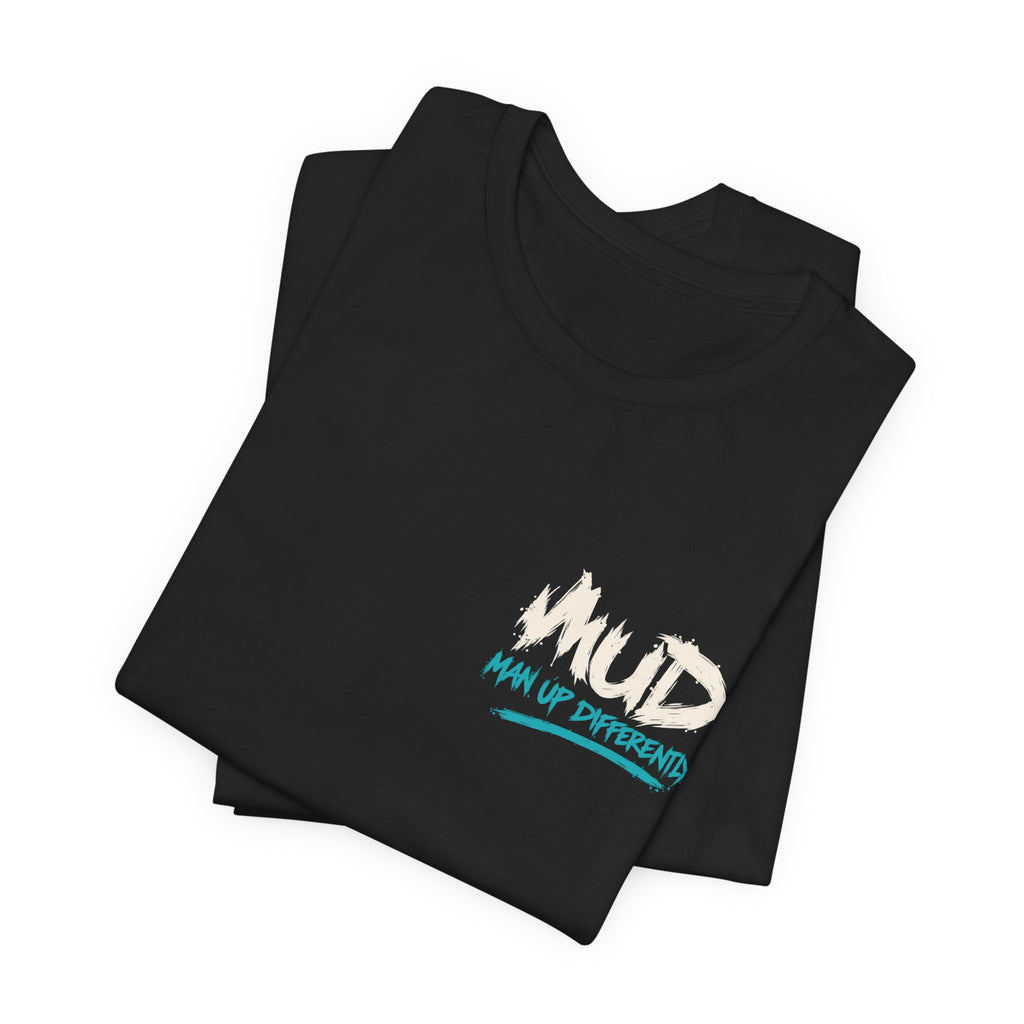 Folded black MUD After Dark Tees showing MUD chest logo