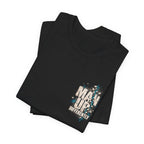 Folded black MUD BREAK THROUGH Tee showing Man Up Differently chest graphic