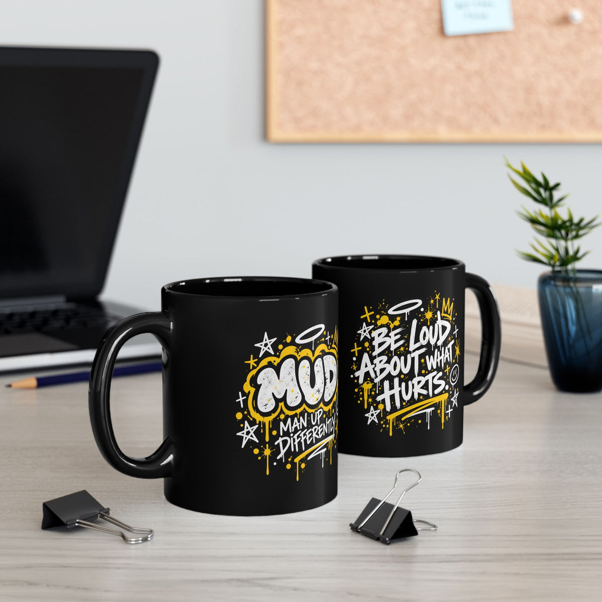 Two Outside The Lines Mugs showing MUD and Be Loud About What Hurts designs