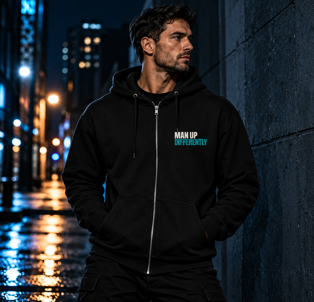 MUD Essential Zip Hoodie lifestyle image in an urban night setting