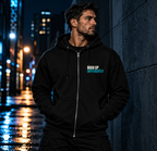 MUD Essential Zip Hoodie lifestyle image in an urban night setting