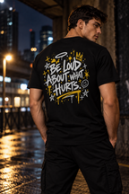 Black BE LOUD Tee back with Be Loud About What Hurts graphic