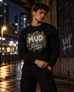 Model wearing black BE LOUD Long Sleeve with MUD chest graphic